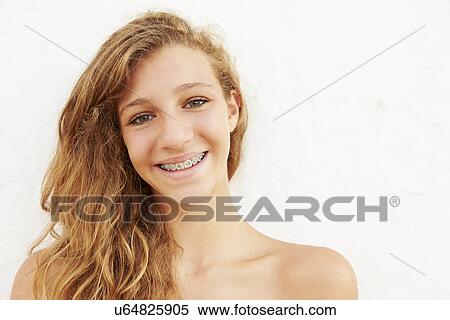 Portrait Of Teenage Girl Leaning Against Wall View Large Photo Image Stock Photography - Portrait Of Teenage Girl Leaning Against Wall. Fotosearch