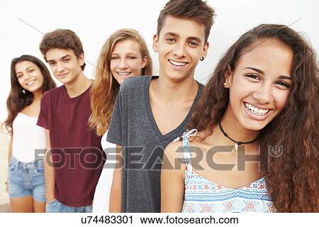 Portrait Of Teenage Group Leaning Against Wall View Large Photo Image Stock Image - Portrait Of Teenage Group Leaning Against Wall. Fotosearch