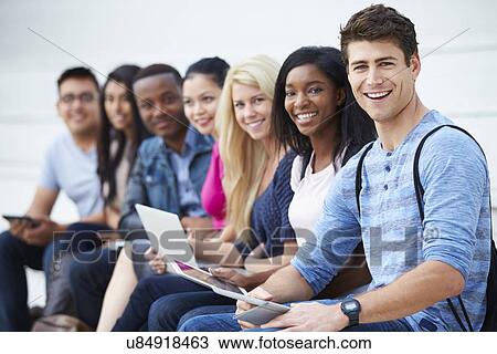 Portrait Of University Students Outdoors On Campus View Large Photo Image Stock Image - Portrait Of University Students Outdoors On Campus. Fotosearch