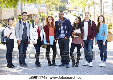 Stock Photo - Portrait Of University Students Outdoors On Campus. Fotosearch