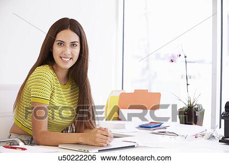 Stock Photograph - Portrait Of Woman Working In Design Studio . Fotosearch