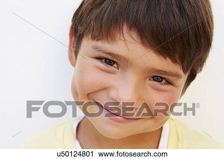 Portrait Of Young Hispanic Boy Standing By Wall View Large Photo Image Stock Image - Portrait Of Young Hispanic Boy Standing By Wall. Fotosearch