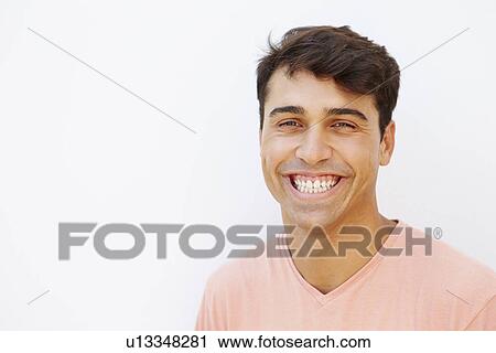 Portrait Of Young Man Standing By Wall View Large Photo Image Stock Image - Portrait Of Young Man Standing By Wall. Fotosearch