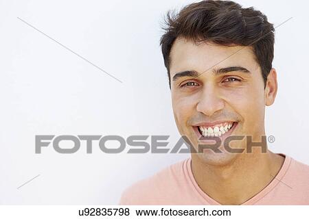 Portrait Of Young Man Standing By Wall View Large Photo Image Stock Photo - Portrait Of Young Man Standing By Wall. Fotosearch