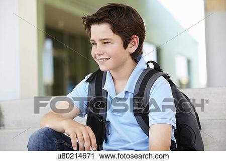 Pre teen boy at school View Large Photo Image Stock Image - Pre teen boy at school. Fotosearch