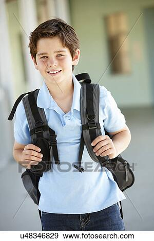 Pre teen boy at school View Large Photo Image Stock Photo - Pre teen boy at school. Fotosearch