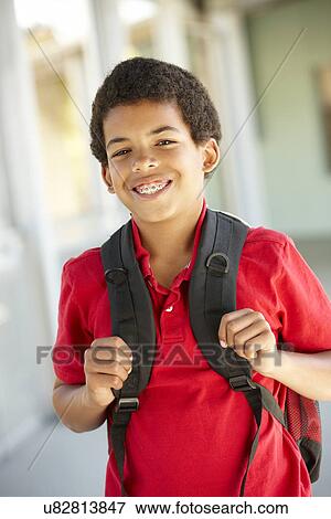 Pre teen boy at school View Large Photo Image Stock Photo - Pre teen boy at school. Fotosearch
