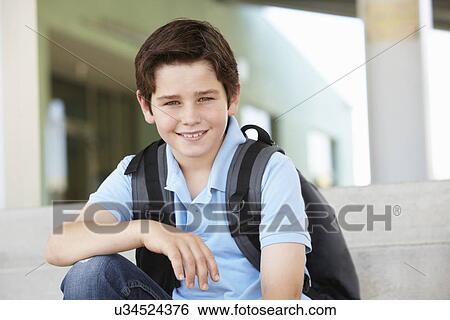 Stock Photograph - Pre teen boy at school. Fotosearch