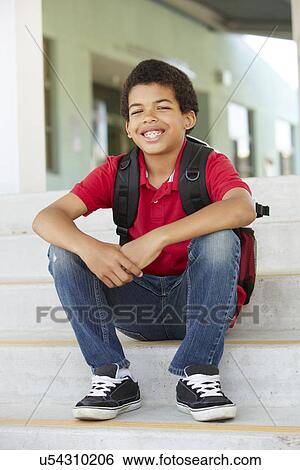 Stock Photograph - Pre teen boy at school. Fotosearch