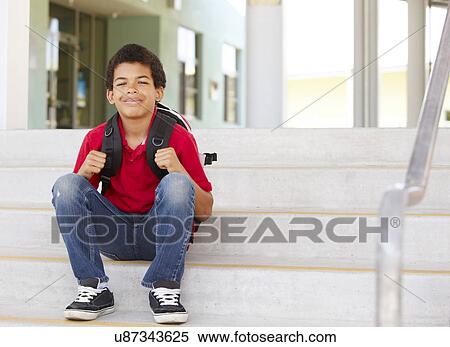 Stock Photography - Pre teen boy at school. Fotosearch