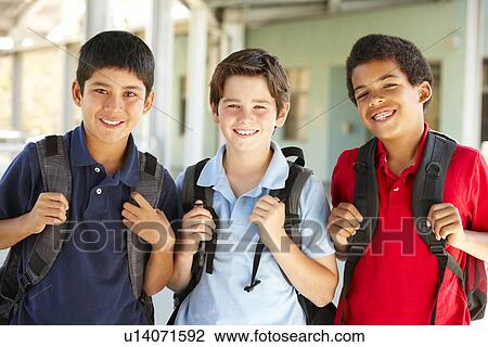 Stock Image - Pre teen boys at school. Fotosearch