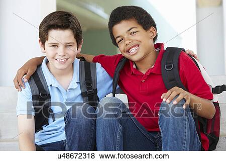 Pre teen boys at school View Large Photo Image Stock Photo - Pre teen boys at school. Fotosearch