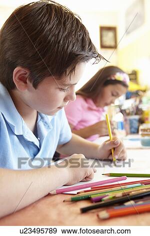 Pre teen children in art class View Large Photo Image Stock Photo - Pre teen children in art class. Fotosearch