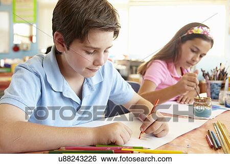 Pre teen children in art class View Large Photo Image Stock Photograph - Pre teen children in art class. Fotosearch
