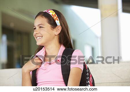 Picture - Pre teen girl at school. Fotosearch