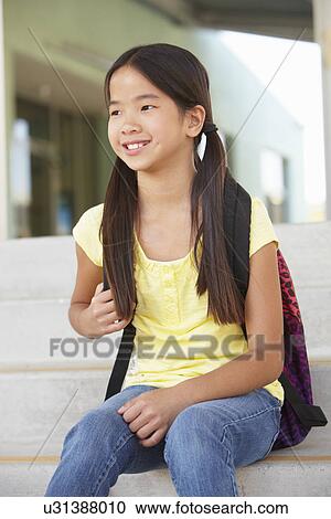 Stock Image - Pre teen girl at school. Fotosearch