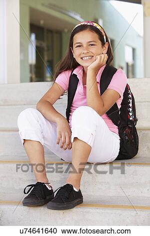 Stock Image - Pre teen girl at school. Fotosearch