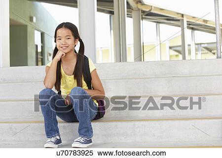 Stock Photography - Pre teen girl at school. Fotosearch