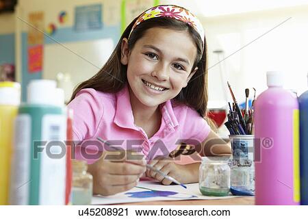 Pre teen girl in art class View Large Photo Image Stock Image - Pre teen girl in art class. Fotosearch