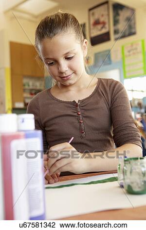 Pre teen girl in art class View Large Photo Image Stock Image - Pre teen girl in art class. Fotosearch