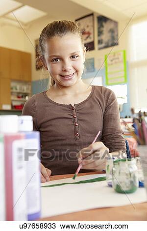 Pre teen girl in art class View Large Photo Image Stock Image - Pre teen girl in art class. Fotosearch