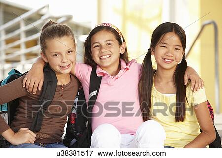 Stock Photo - Pre teen girls in school. Fotosearch
