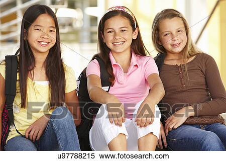 Stock Photography - Pre teen girls in school. Fotosearch