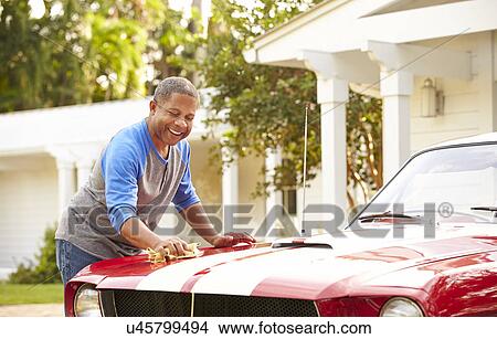 Retired Senior Man Cleaning Restored Car View Large Photo Image Picture - Retired Senior Man Cleaning Restored Car. Fotosearch
