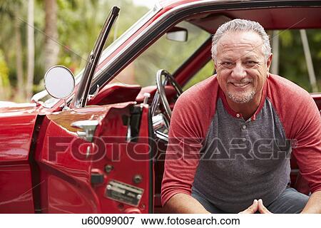 Retired Senior Man Sitting In Restored Classic Car View Large Photo Image Stock Photo - Retired Senior Man Sitting In Restored Classic Car. Fotosearch