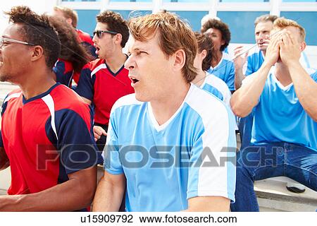Stock Image - Rival Spectators Watching Sports Event. Fotosearch