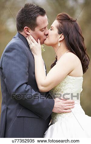Stock Photography - Romantic Bride And Groom On Wedding Day. Fotosearch