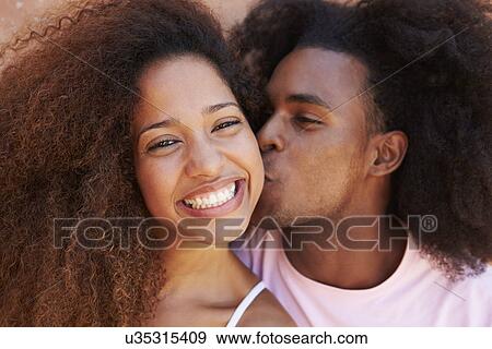 Romantic Couple On Holiday Together Posing By Wall View Large Photo Image Stock Photo - Romantic Couple On Holiday Together Posing By Wall. Fotosearch