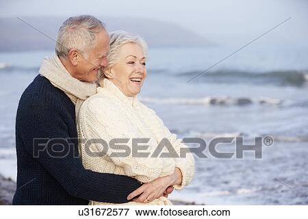 Romantic Senior Couple On Winter Beach View Large Photo Image Stock Photo - Romantic Senior Couple On Winter Beach. Fotosearch