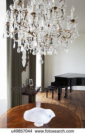 Picture - Room In Modern House With Chandelier And Grand Piano. Fotosearch