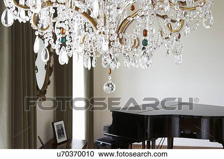 Room In Modern House With Chandelier And Grand Piano View Large Photo Image Stock Image - Room In Modern House With Chandelier And Grand Piano. Fotosearch