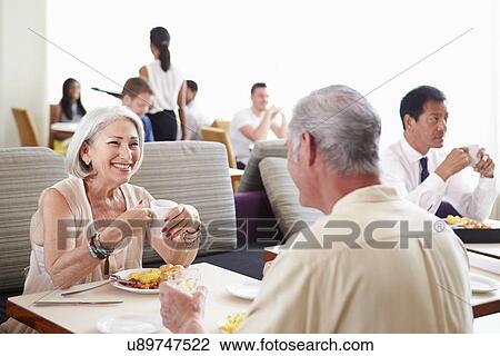 Senior Couple Enjoying Breakfast In Hotel Restaurant View Large Photo Image Stock Image - Senior Couple Enjoying Breakfast In Hotel Restaurant. Fotosearch