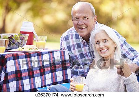Senior Couple Enjoying Camping Holiday In Countryside View Large Photo Image Picture - Senior Couple Enjoying Camping Holiday In Countryside. Fotosearch