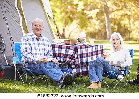 Senior Couple Enjoying Camping Holiday In Countryside View Large Photo Image Stock Image - Senior Couple Enjoying Camping Holiday In Countryside. Fotosearch