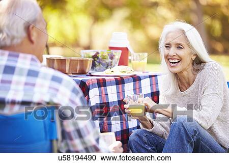 Senior Couple Enjoying Camping Holiday In Countryside View Large Photo Image Stock Image - Senior Couple Enjoying Camping Holiday In Countryside. Fotosearch
