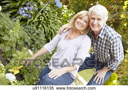Stock Photography - Senior couple gardening. Fotosearch