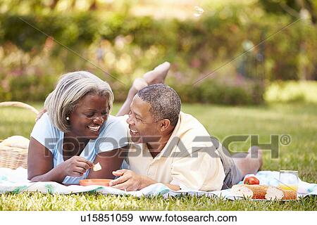 Senior Couple Having Picnic In Garden View Large Photo Image Stock Photo - Senior Couple Having Picnic In Garden . Fotosearch