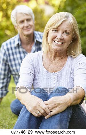 Stock Photo - Senior couple in garden. Fotosearch