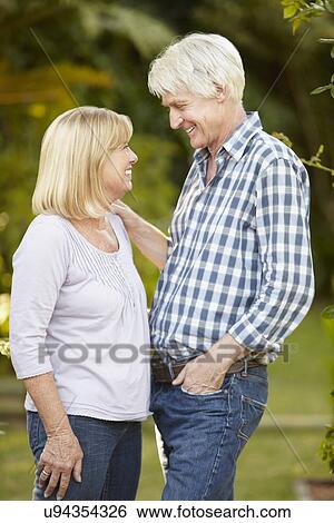 Senior couple in garden View Large Photo Image Stock Photograph - Senior couple in garden. Fotosearch