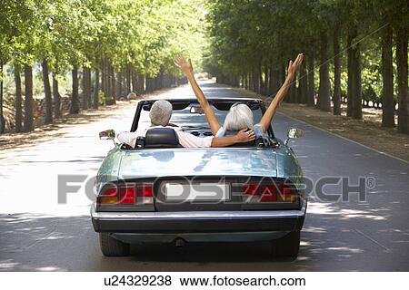 Senior couple in sports car View Large Photo Image Stock Photo - Senior couple in sports car. Fotosearch