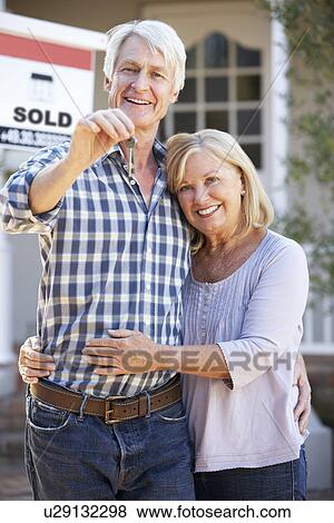 Senior couple moving house View Large Photo Image Stock Photo - Senior couple moving house. Fotosearch