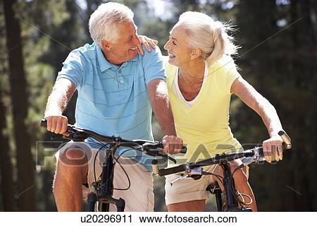 Senior couple on country bike ride View Large Photo Image Stock Image - Senior couple on country bike ride. Fotosearch