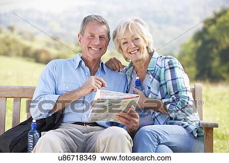 Stock Photo - Senior couple on country walk. Fotosearch