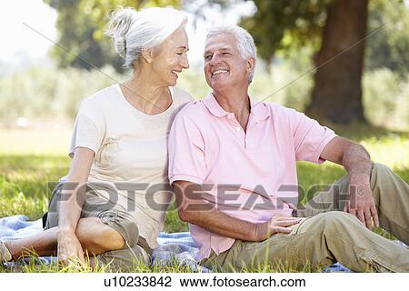 Stock Image - Senior couple outdoors. Fotosearch