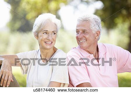 Senior couple outdoors View Large Photo Image Stock Image - Senior couple outdoors. Fotosearch