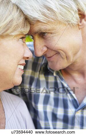 Senior couple outdoors View Large Photo Image Stock Image - Senior couple outdoors. Fotosearch